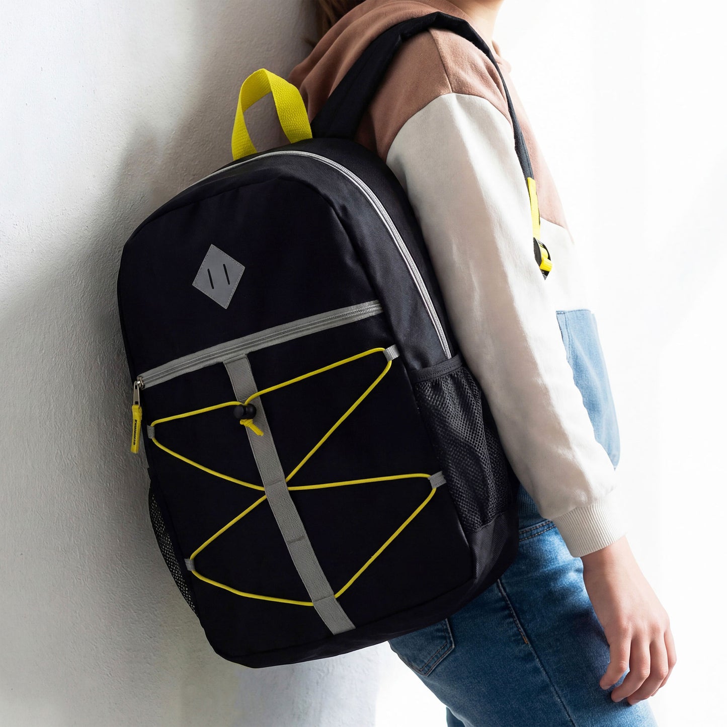 17" Bungee Cord & Daisy Chain Design Wholesale Backpacks in 12 Assorted Colors - Bulk Case of 24 ($6.55 / UNIT - ITEM: DWBP-360-24)